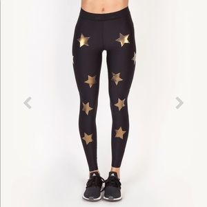 Ultracor Black and Gold Star Leggings Size Medium
